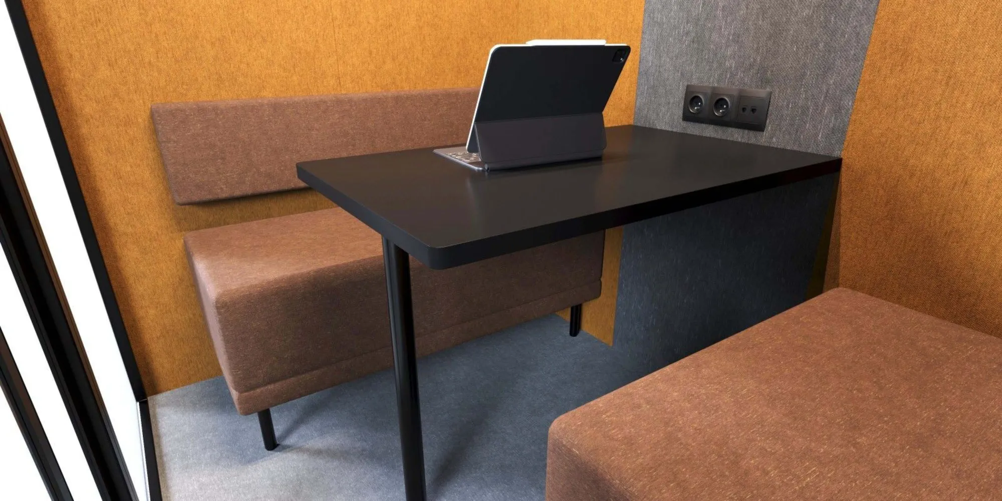 Interieur van HalloPod 3 vergadercabine voor vergaderen van CoGa met een oranje-rood interieur met tafel en aansluitmogelijkheden