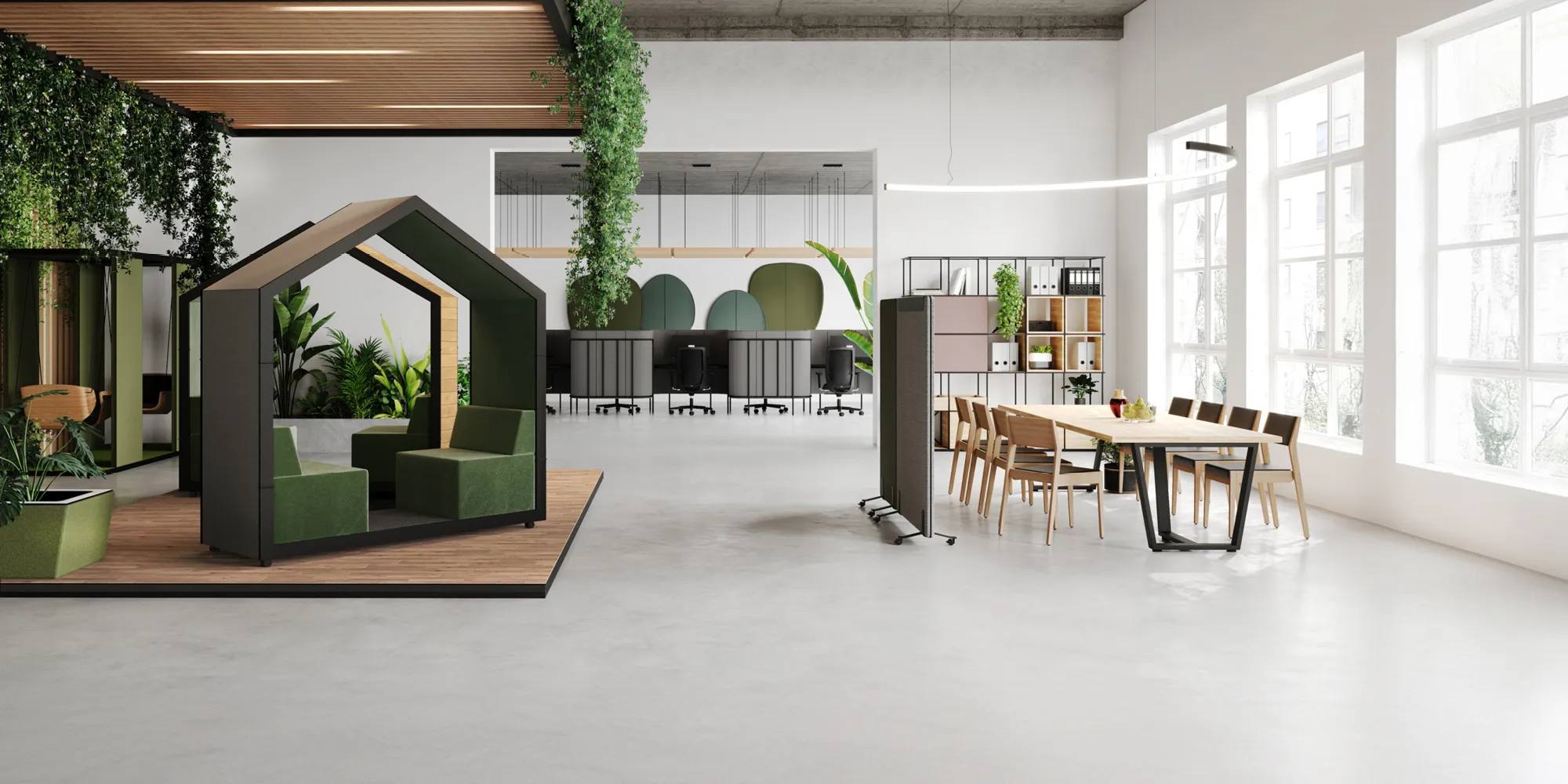 Een ruimte ingericht met een vergadercabine en vergadertafel op basis van Biophilic Design principes