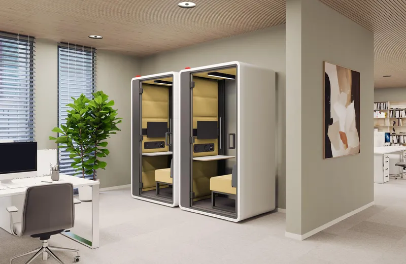 kantoorinrichting-werkcabines-mikomax-hybrid-s 1000x650px6 Een sfeerimpressie van een kantoor waarin 2 Mikomax hushFree S hybrid cabines staan