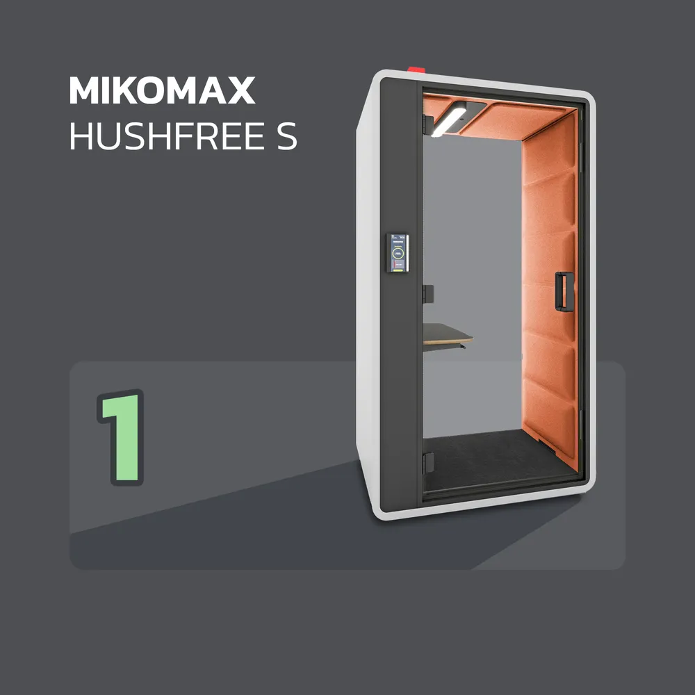 Een witte HushFreeS belcabine van Mikomax met een rood interieur met daarin een in hoogte verstelbaar tafelblad.