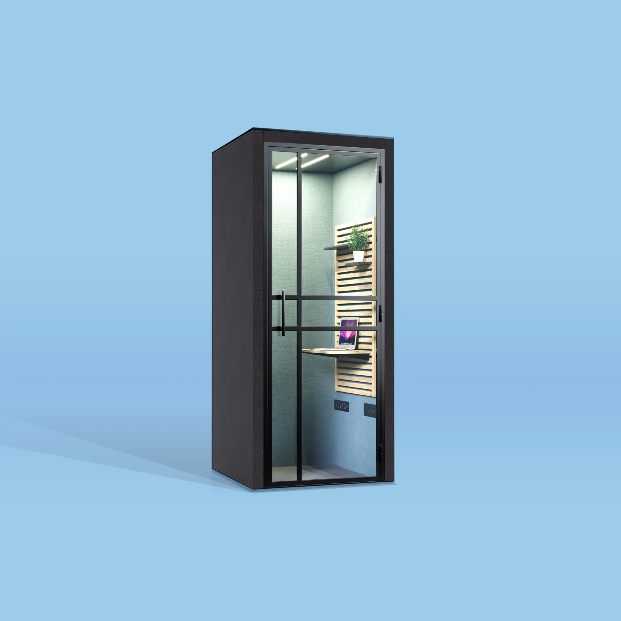 Een zwarte HalloPod 1 belcabine voor korte telefoontjes van het merk CoGa met een blauw-groen interieur met een in hoogte verstelbaar tafelblad